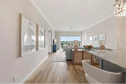 7687 Pebble Creek Cir #502, Naples, FL 34108 - Photo 3