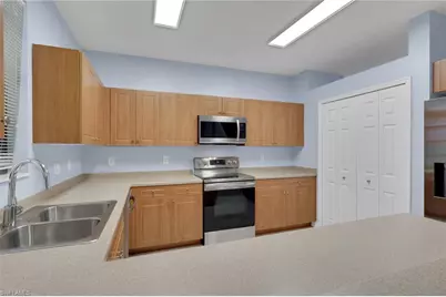 15454 Summit Place Cir #125, Naples, FL 34119 - Photo 9