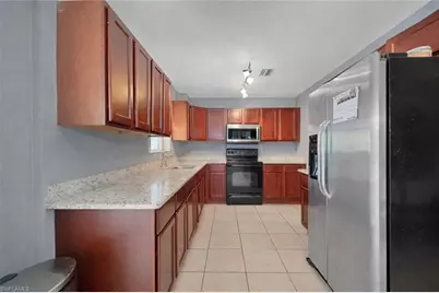 321 14th St NE, Naples, FL 34120 - Photo 5