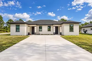 1103/1105 Dean St E, Lehigh Acres, FL 33974 - Photo 1