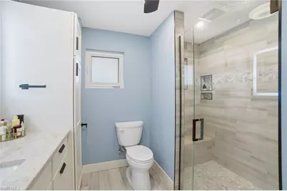 560 Cypress Way E, Naples, FL 34110 - Photo 11