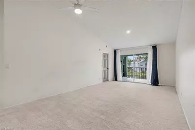 153 Wading Bird Cir #J201, Naples, FL 34110 - Photo 13
