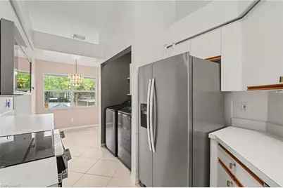 153 Wading Bird Cir #J201, Naples, FL 34110 - Photo 7