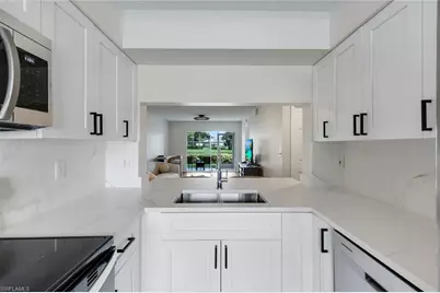 121 Wading Bird Cir #103, Naples, FL 34110 - Photo 11