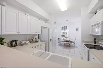 3940 Loblolly Bay Dr #2-104, Naples, FL 34114 - Photo 9