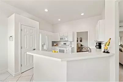 2256 Island Cove Cir, Naples, FL 34109 - Photo 13