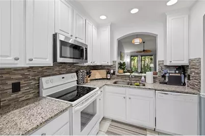 7715 Woodbrook Cir #3402, Naples, FL 34104 - Photo 9