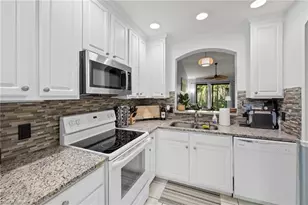 7715 Woodbrook Cir, Naples, FL 34104 - Photo 9