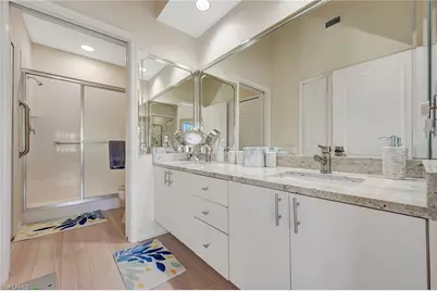 7654 Pebble Creek Cir #303, Naples, FL 34108 - Photo 21