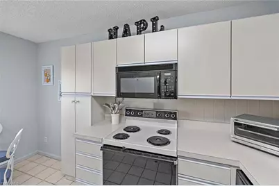 10686 Gulf Shore Dr #A-104, Naples, FL 34108 - Photo 13