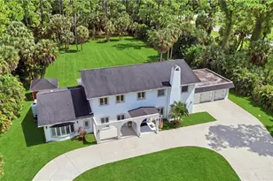 130 1st St NW, Naples, FL 34120 - Photo 1