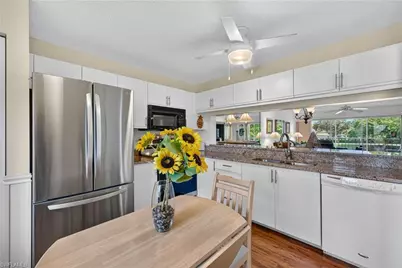 6945 Dennis Cir #203, Naples, FL 34104 - Photo 11