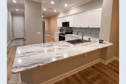 4864 Hampshire Ct #104, Naples, FL 34112 - Photo 1