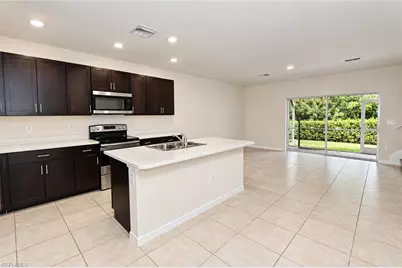15449 Wildflower Cir, Naples, FL 34119 - Photo 5