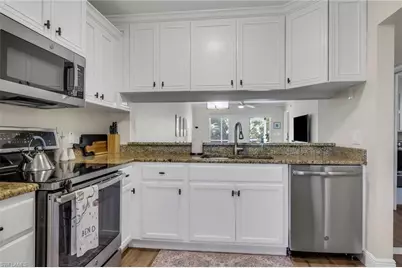 3031 Sandpiper Bay Cir #F106, Naples, FL 34112 - Photo 3