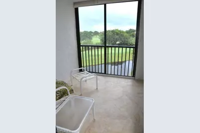7040 Pelican Bay Blvd #404, Naples, FL 34108 - Photo 13