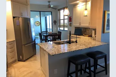 7040 Pelican Bay Blvd #404, Naples, FL 34108 - Photo 5