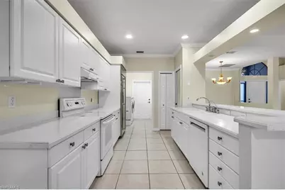 4407 Pomarine Ct, Naples, FL 34119 - Photo 11
