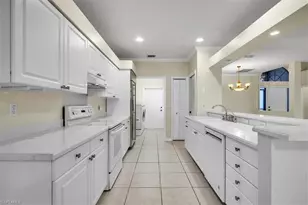 4407 Pomarine Ct, Naples, FL 34119 - Photo 11