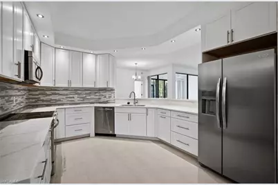7056 Pelican Bay Blvd #B102, Naples, FL 34108 - Photo 9