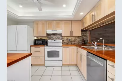 1600 Misty Pines Cir #303, Naples, FL 34105 - Photo 3