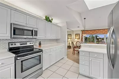 798 Eagle Creek Dr #302, Naples, FL 34113 - Photo 9