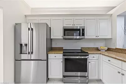7741 Pebble Creek Cir #102, Naples, FL 34108 - Photo 23