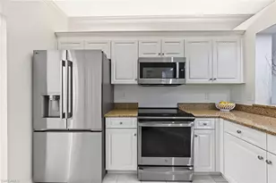7741 Pebble Creek Cir, Naples, FL 34108 - Photo 23