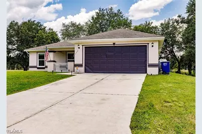 122 Teakwood Dr, Lehigh Acres, FL 33974 - Photo 1