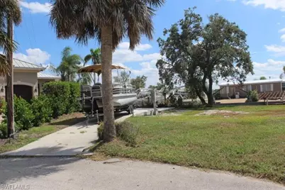 24605 Dolphin St, Bonita Springs, FL 34134 - Photo 1