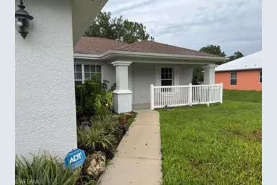 1013 Belmont St E, Lehigh Acres, FL 33974 - Photo 1