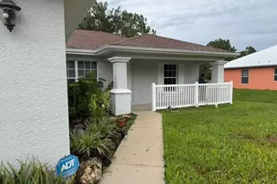 1013 Belmont St E, Lehigh Acres, FL 33974 - Photo 1
