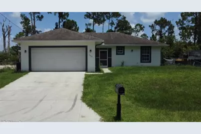 709 Puccini Ave S, Lehigh Acres, FL 33974 - Photo 1
