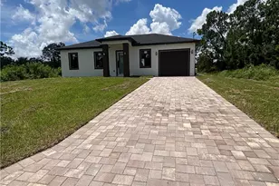 1034 Iris St E, Lehigh Acres, FL 33974 - Photo 1