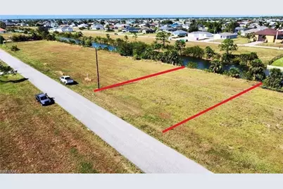 323 NE 25th St, Cape Coral, FL 33909 - Photo 1