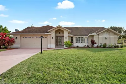 547 Foxcreek Dr, Lehigh Acres, FL 33974 - Photo 1