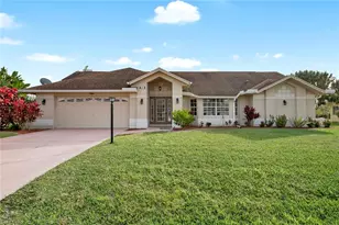 547 Foxcreek Dr, Lehigh Acres, FL 33974 - Photo 1