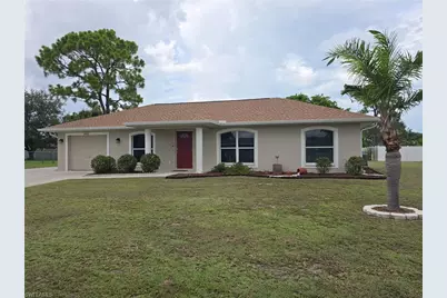 1642 Cheshire Cir N, Lehigh Acres, FL 33936 - Photo 1