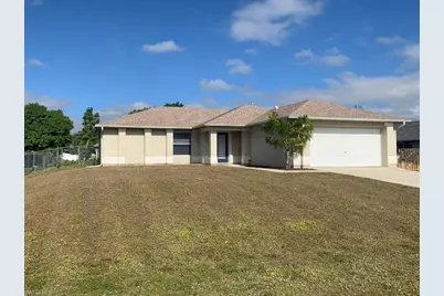 703 SW 22nd St, Cape Coral, FL 33991 - Photo 1