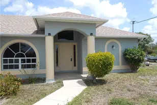 407 Chamonix Ave S, Lehigh Acres, FL 33974 - Photo 1