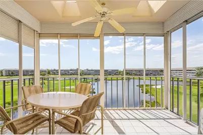 14891 Hole in One Cir #PH10 - MUIRFIELD, Fort Myers, FL 33919 - Photo 1