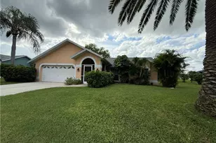 546 Whispering Wind Bend, Lehigh Acres, FL 33974 - Photo 1