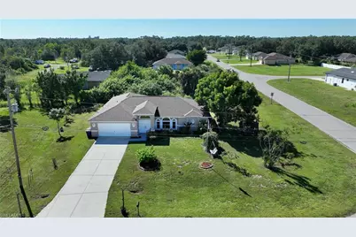 575 Bourse Cir, Lehigh Acres, FL 33974 - Photo 1