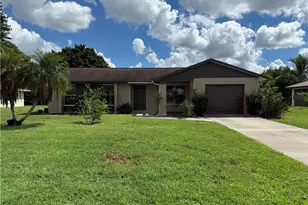 111 Richmond Ave S, Lehigh Acres, FL 33936 - Photo 1