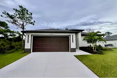 3208 66th St W, Lehigh Acres, FL 33971 - Photo 1