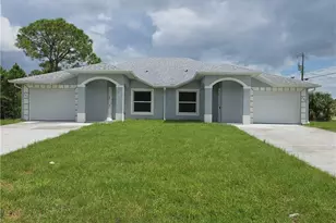 397 Carrillon Ave S, Lehigh Acres, FL 33974 - Photo 1