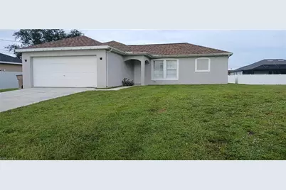 411 NE Juanita Pl, Cape Coral, FL 33909 - Photo 1