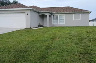 411 NE Juanita Pl, Cape Coral, FL 33909 - Photo 1