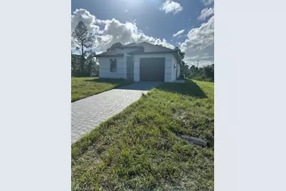 810 Downer Ave S, Lehigh Acres, FL 33974 - Photo 1