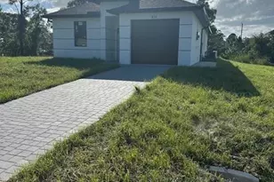 810 Downer Ave S, Lehigh Acres, FL 33974 - Photo 1